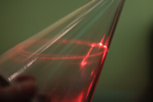 Conic Section laser at the Museum of Math